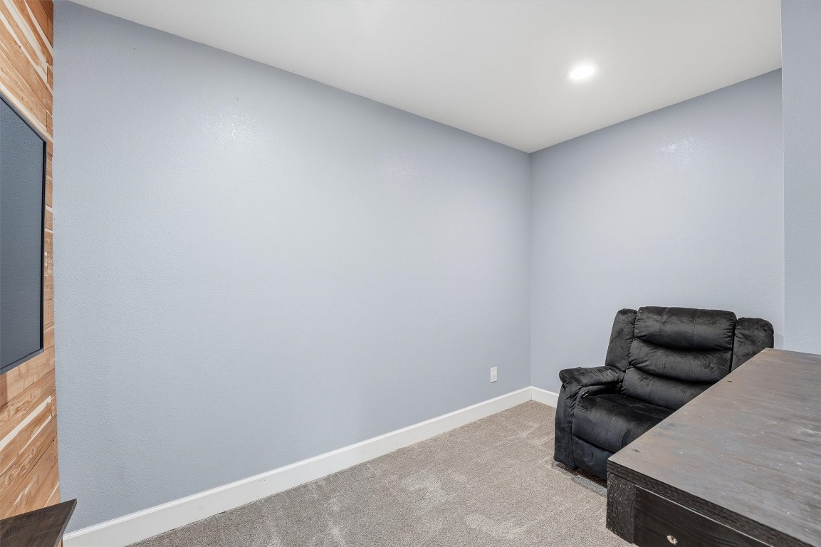 2920 Superior Road Magnolia, TX 77354 - Photo 22 of 46 a room with furniture and a wooden floor