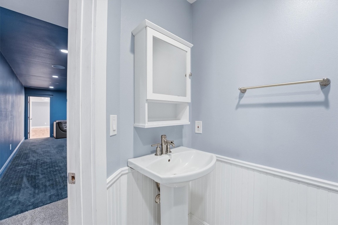 2920 Superior Road Magnolia, TX 77354 - Photo 26 of 46 a bathroom with a sink a vanity and a mirror