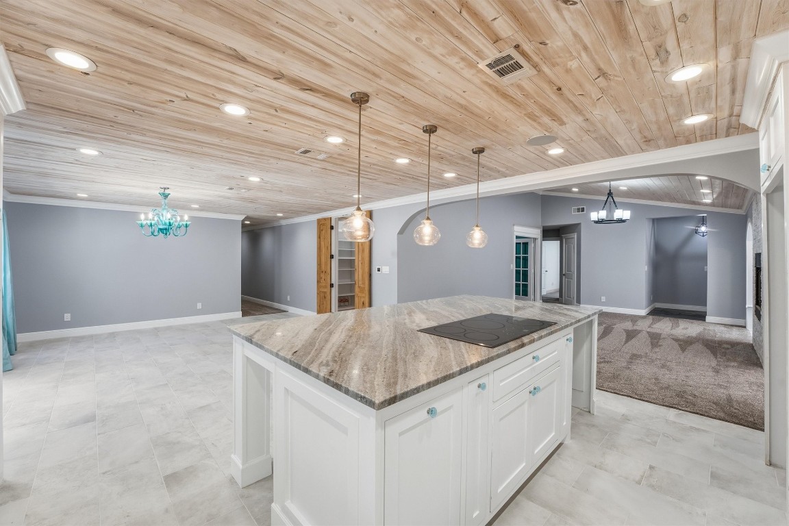 2920 Superior Road Magnolia, TX 77354 - Photo 4 of 46 a kitchen with granite countertop a sink and a counter top space
