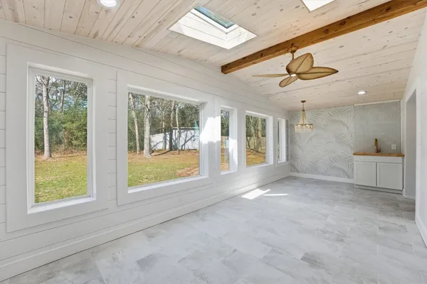 a view of a livingroom with a staircase