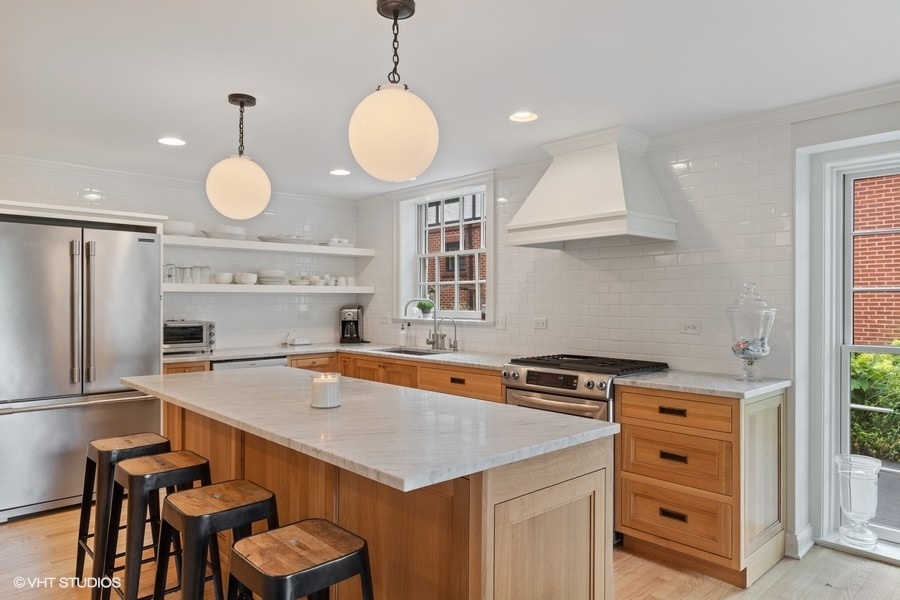 162 Maplewood Road Riverside, IL 60546 - Photo 11 of 44 a kitchen that has a cabinets and a stove