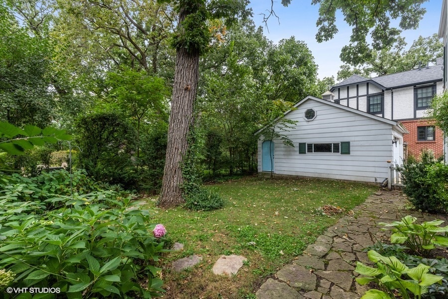 162 Maplewood Road Riverside, IL 60546 - Photo 40 of 44 a front view of a house with garden