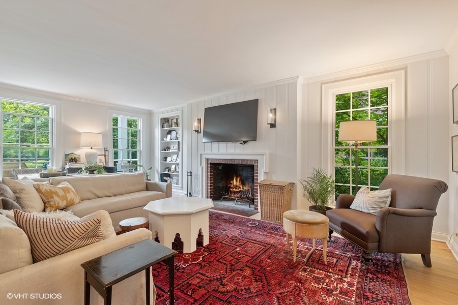 162 Maplewood Road Riverside, IL 60546 - Photo 7 of 44 a living room with furniture and a fireplace