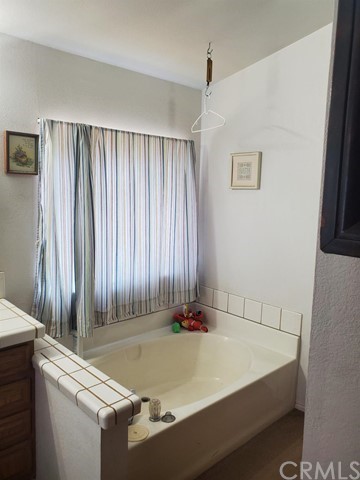 12285 Golden View Road Pinon Hills, CA 92372 - Photo 23 of 33 a view of kitchen and utility room