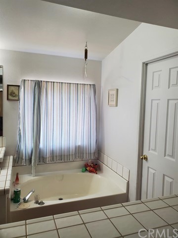 12285 Golden View Road Pinon Hills, CA 92372 - Photo 33 of 33 an empty room with windows