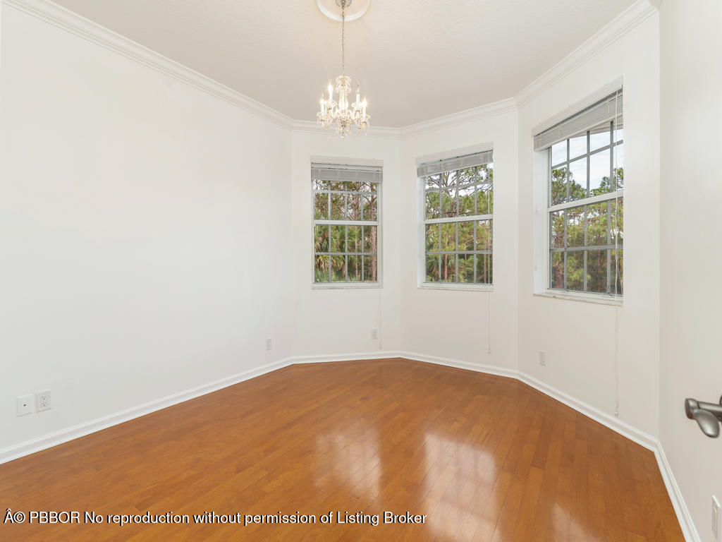 1001 Southeast Ranch Road Northeast Jupiter, FL 33478 - Photo 17 of 32 a view of empty room with window