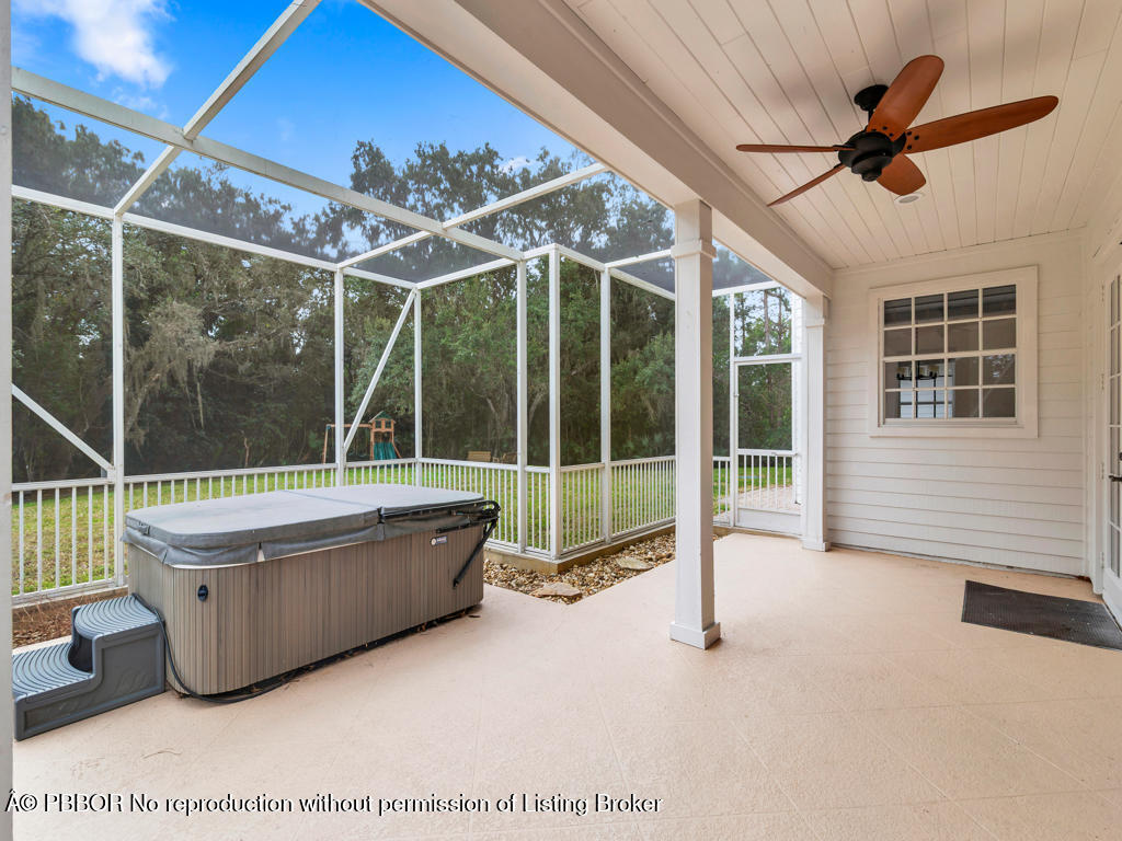 1001 Southeast Ranch Road Northeast Jupiter, FL 33478 - Photo 21 of 32 a room with couch