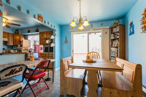 a view of a dining room with furniture