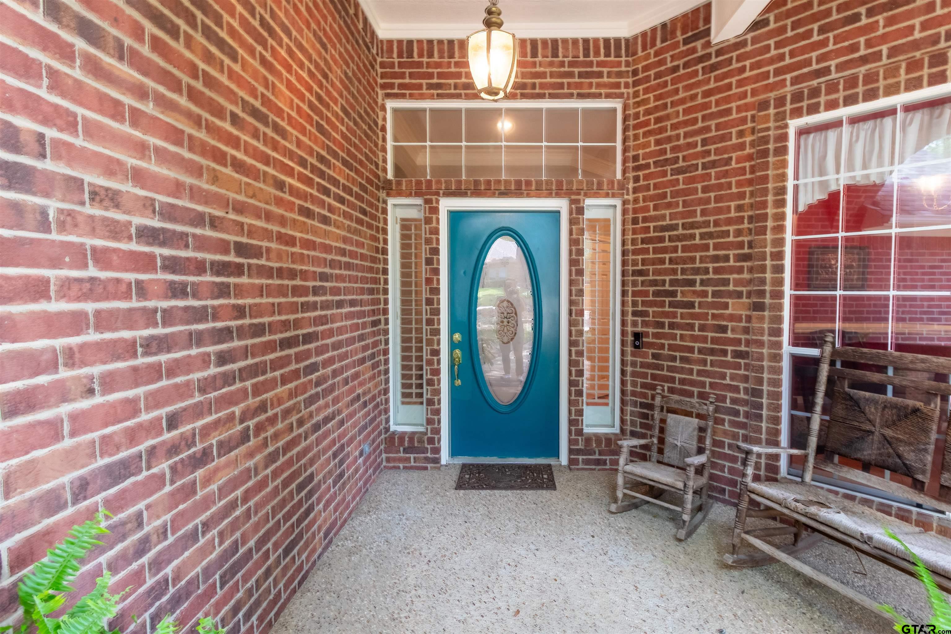 1388 Santa Fe Trail Tyler, TX 75703 - Photo 5 of 46 a front view of a house with glass windows