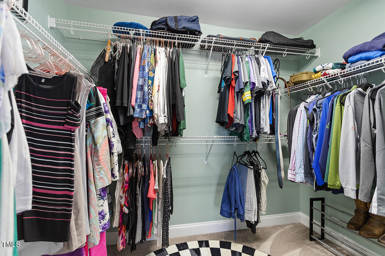 10145 Mizner Lane Raleigh, NC 27617 - Photo 23 of 61 Large walk-in closet in primary bedroom
