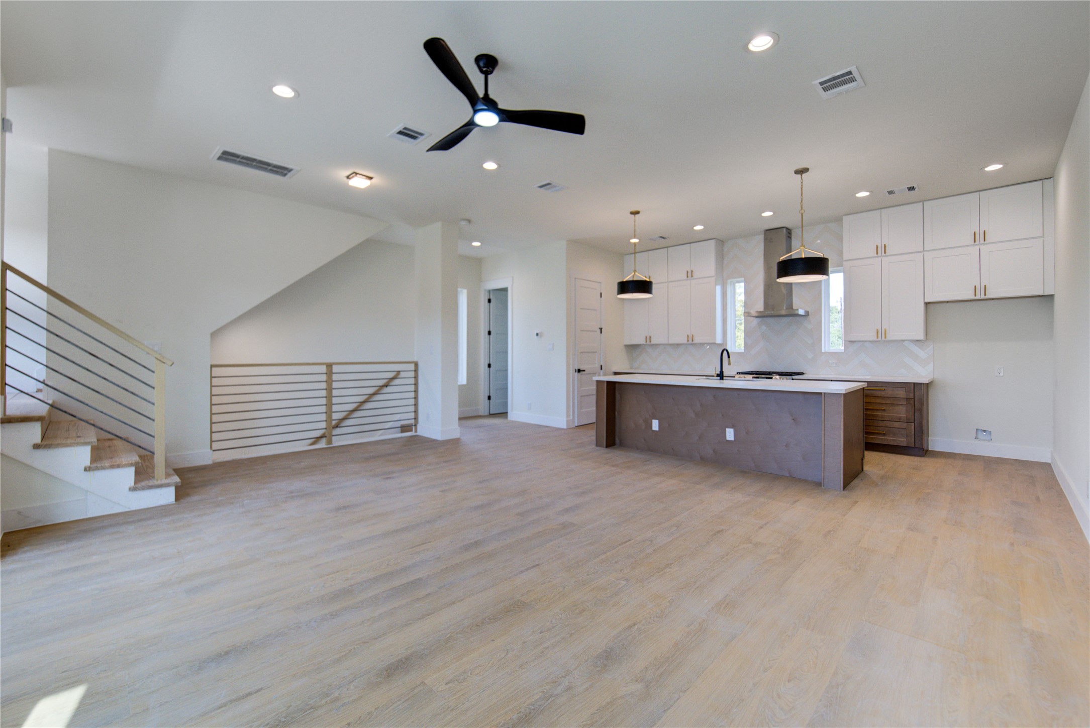 4702 Coke Street Houston, TX 77020 - Photo 11 of 35 a view of kitchen and kitchen with a sink wooden floor