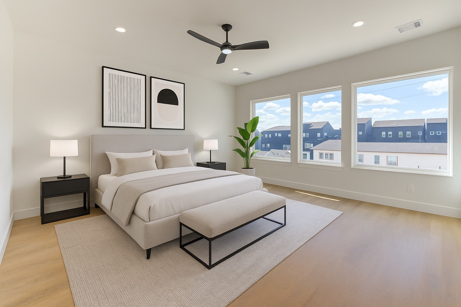 4702 Coke Street Houston, TX 77020 - Photo 20 of 35 a spacious bedroom with a large bed and a large window