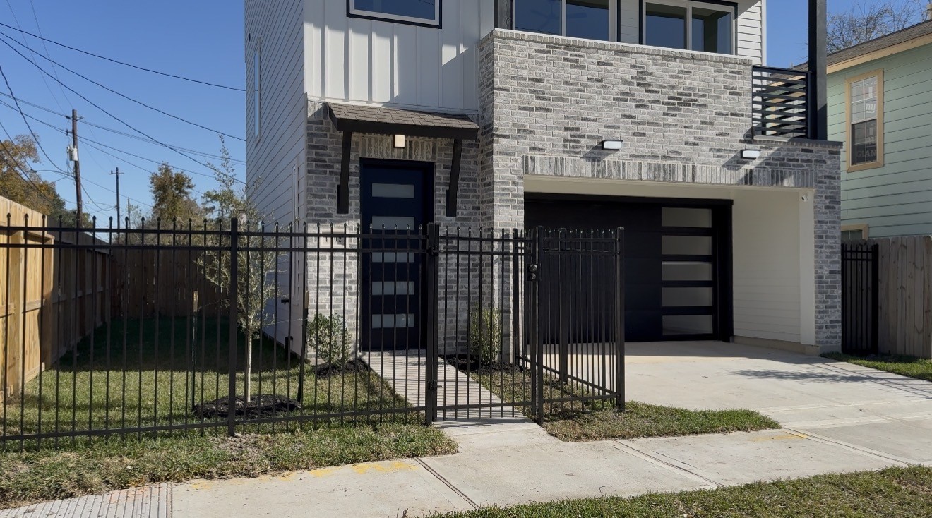 4702 Coke Street Houston, TX 77020 - Photo 2 of 35 a view of a house with a door and wooden fence