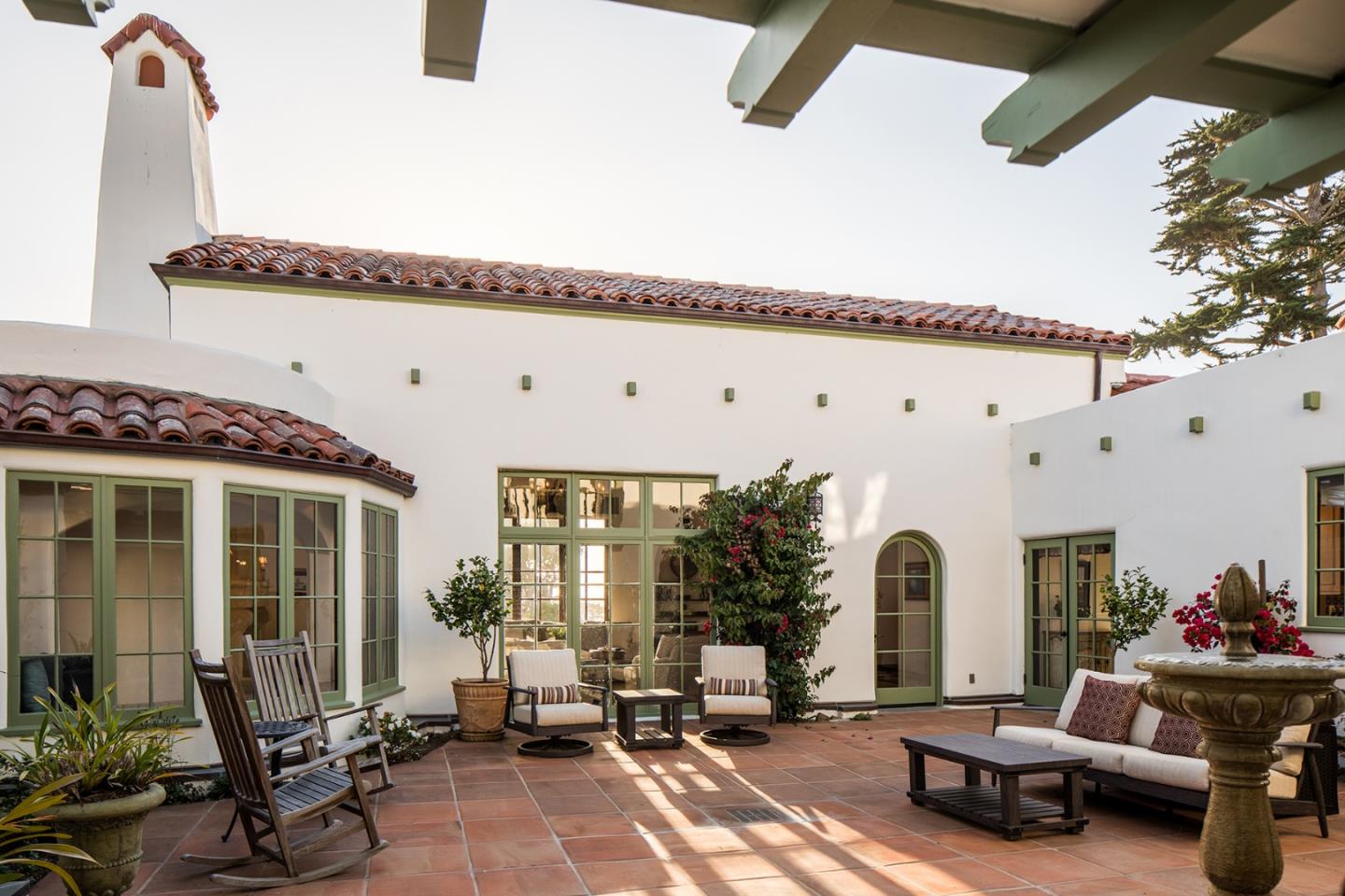 1011 Rodeo Road Pebble Beach, CA 93953 - Photo 15 of 41 a building outdoor space with patio furniture