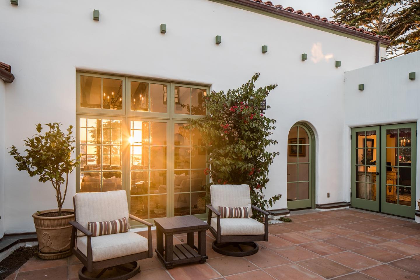 1011 Rodeo Road Pebble Beach, CA 93953 - Photo 16 of 41 a outdoor living space with furniture and potted plants
