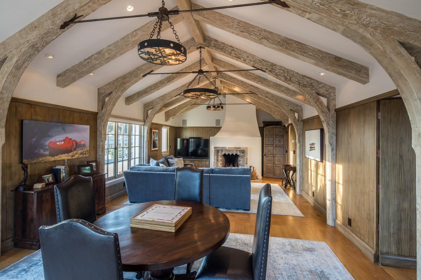 1011 Rodeo Road Pebble Beach, CA 93953 - Photo 22 of 41 a view of a dining room with furniture window and wooden floor