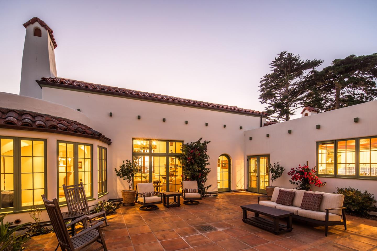 1011 Rodeo Road Pebble Beach, CA 93953 - Photo 38 of 41 a living room with furniture and large windows