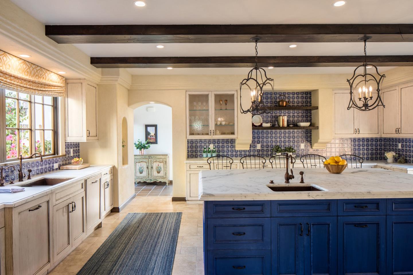 1011 Rodeo Road Pebble Beach, CA 93953 - Photo 5 of 41 a kitchen with sink and wooden floor