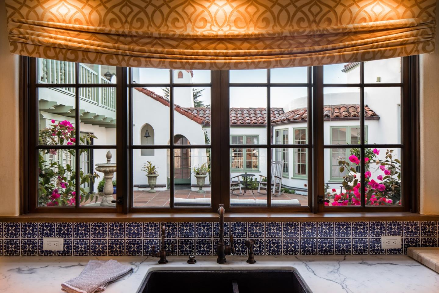 1011 Rodeo Road Pebble Beach, CA 93953 - Photo 8 of 41 a room with furniture and window