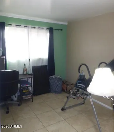 a room with furniture and a window