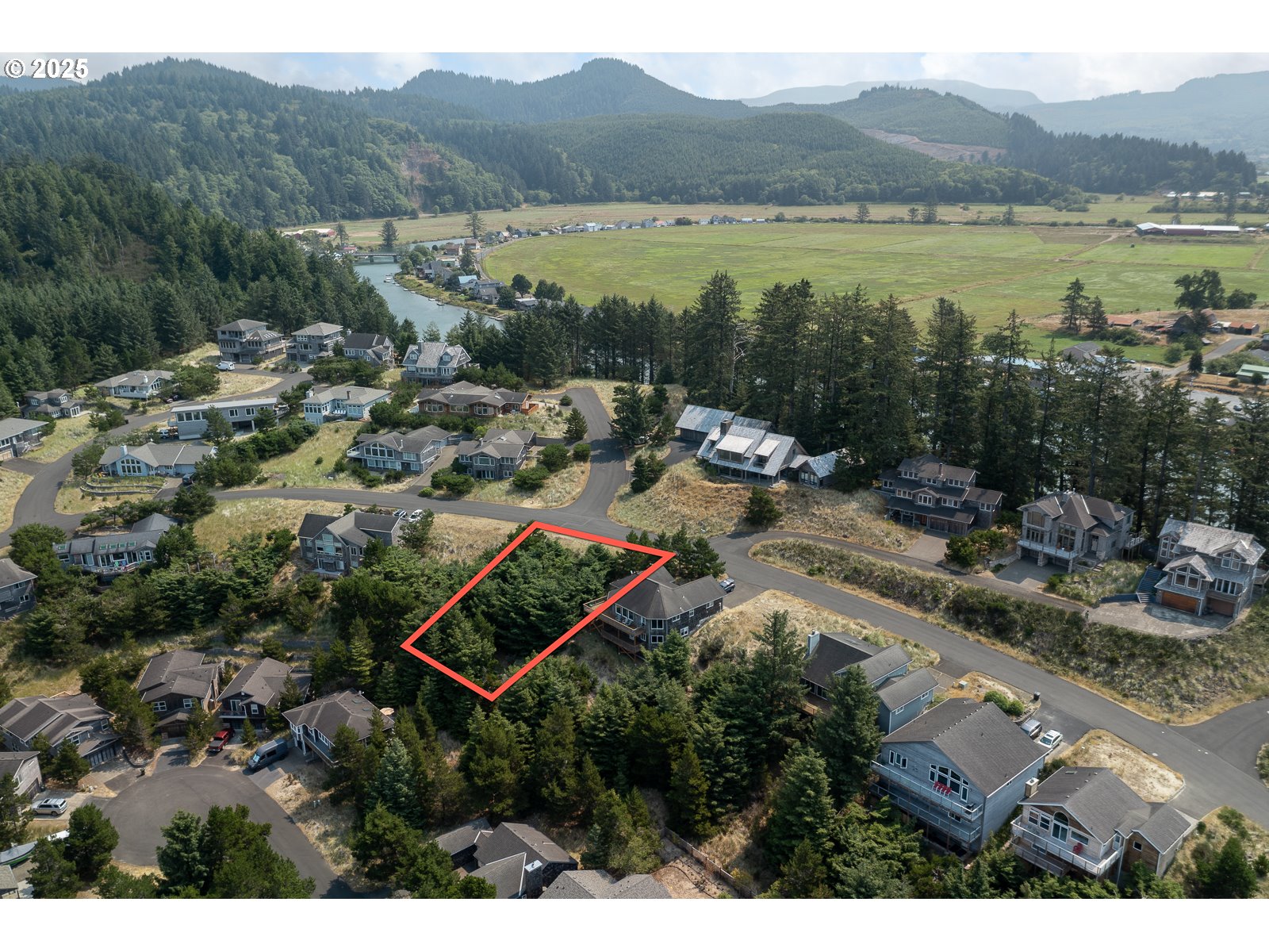 50 Nestucca Ridge Road Pacific City, OR 97135 - Photo 7 of 10 a view of lake with mountain