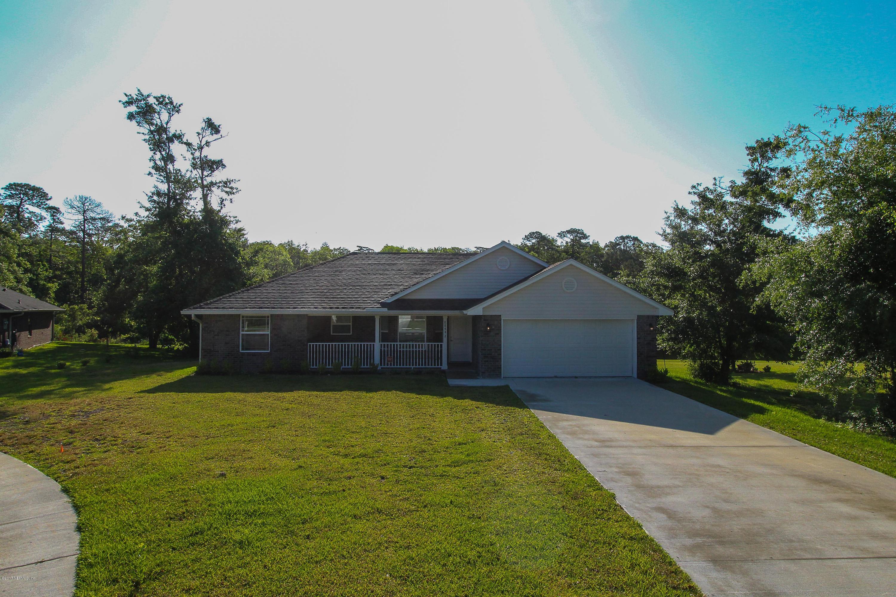 88442 Maybourne Road Yulee, FL 32097 - Photo 2 of 29 a view of a yard in front of house