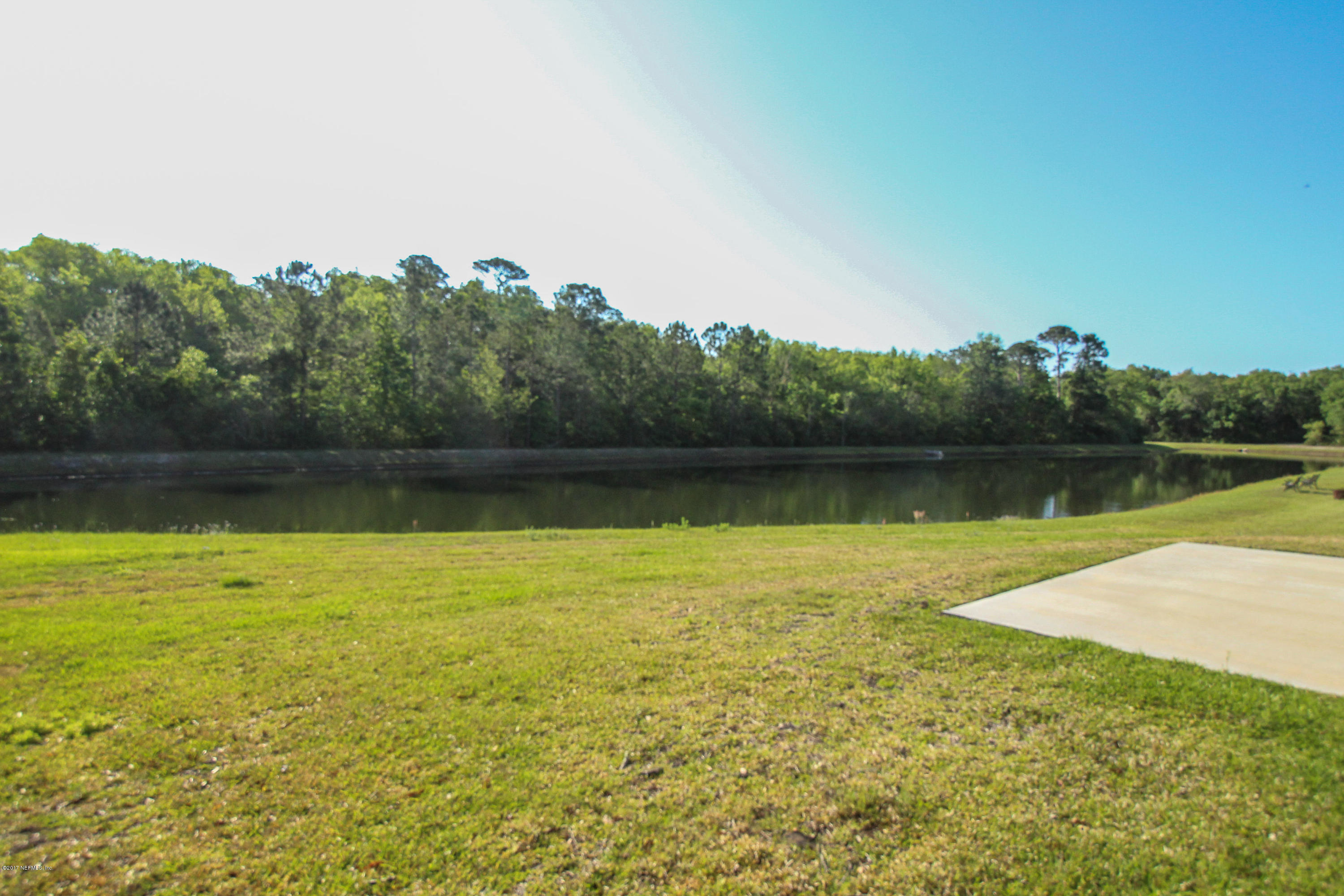 88442 Maybourne Road Yulee, FL 32097 - Photo 23 of 29 a view of a lake