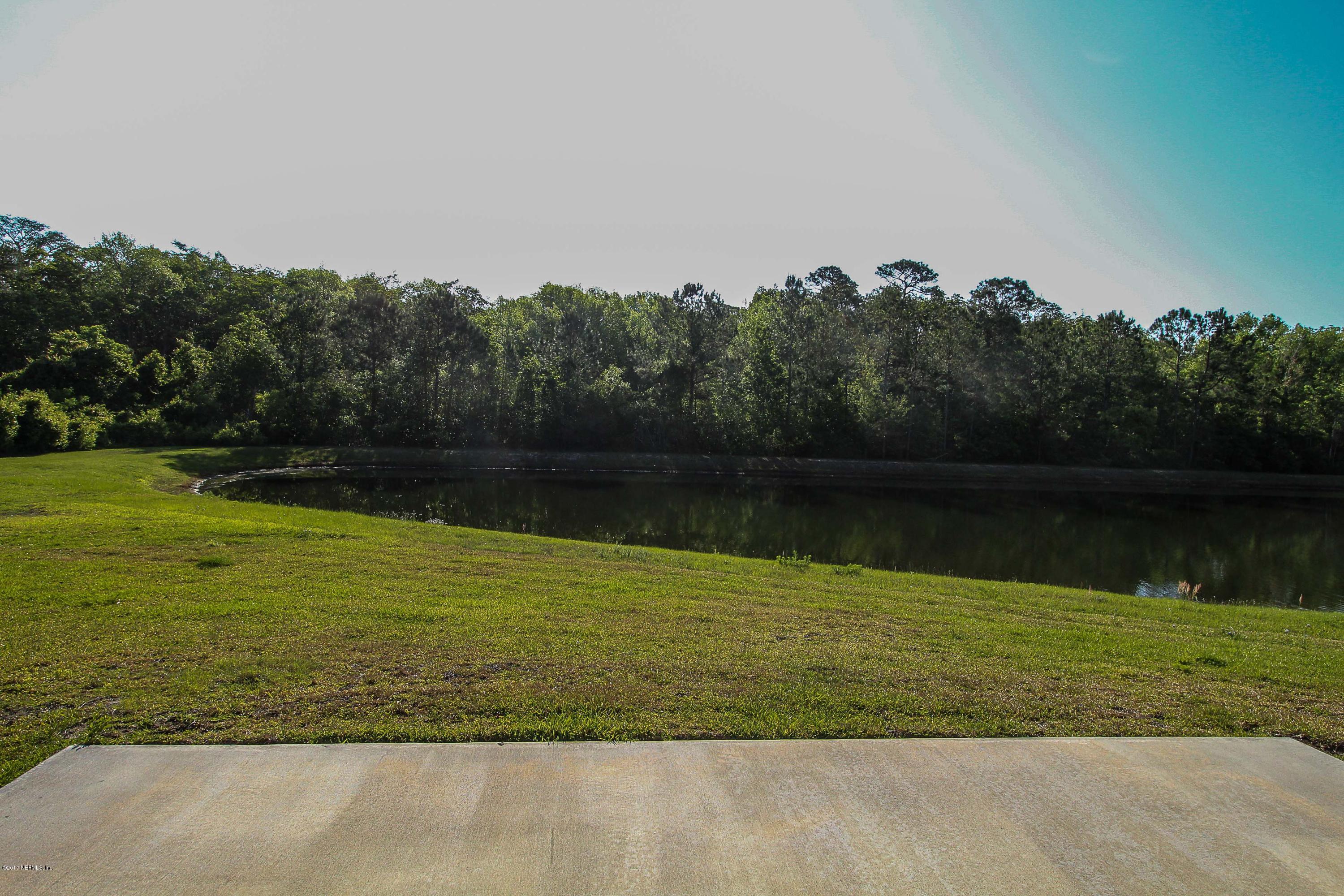 88442 Maybourne Road Yulee, FL 32097 - Photo 27 of 29 a view of a lake