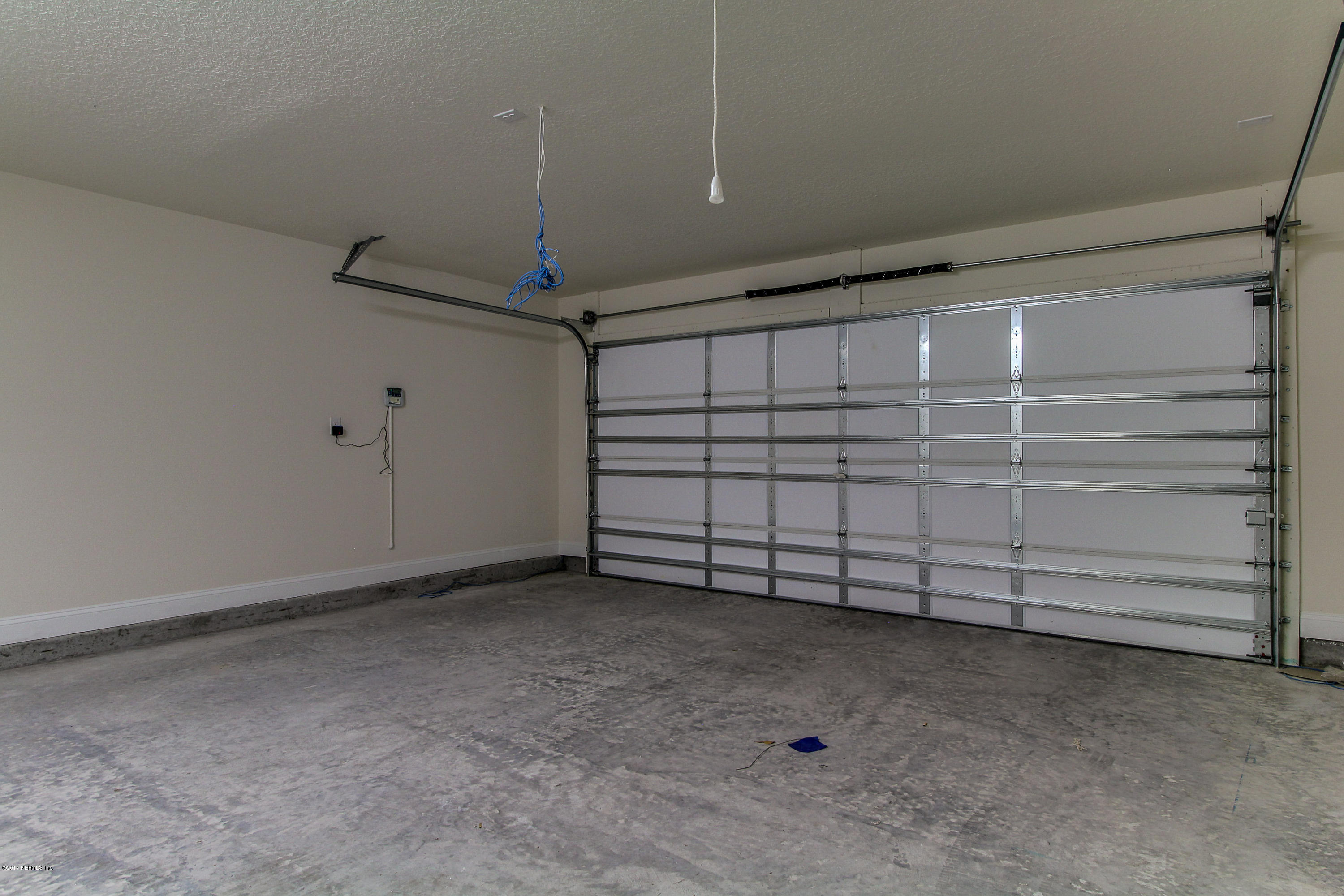 88442 Maybourne Road Yulee, FL 32097 - Photo 29 of 29 a view of a garage