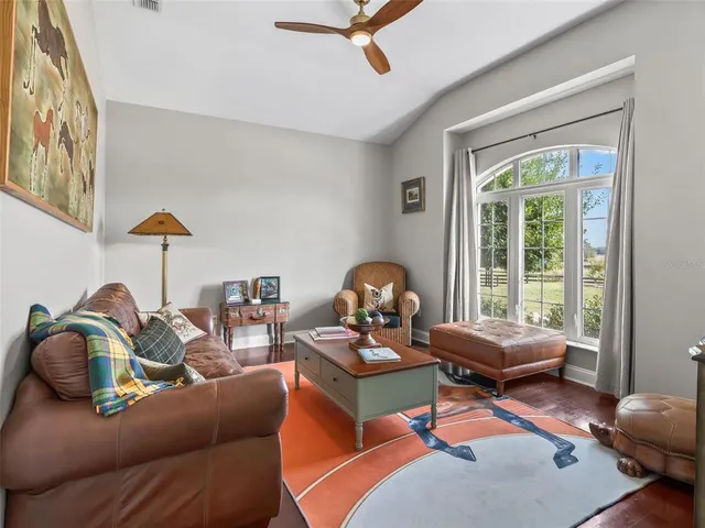 a living room with furniture and a window