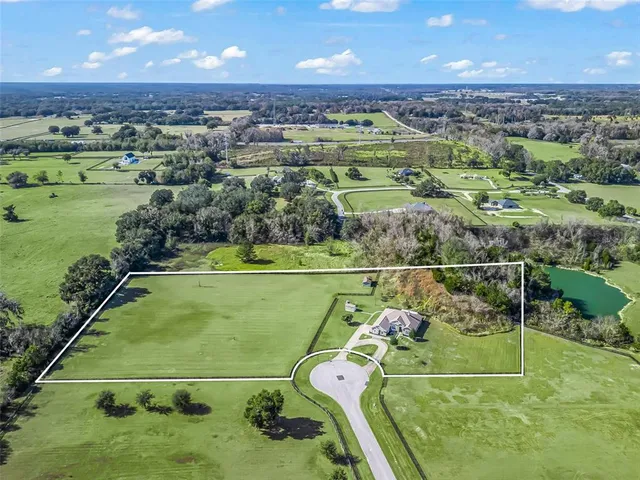 an aerial view of a golf course with a play ground