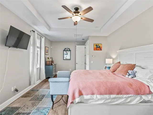 a bathroom with a bathtub and a window