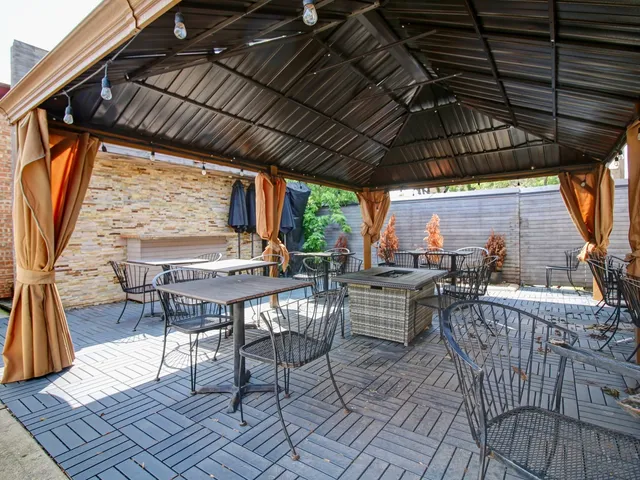 a view of an outdoor space with furniture