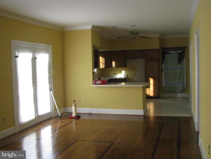 8388 Old Stillhouse Road Rixeyville, VA 22737 - Photo 1 of 15 a view of a room with wooden floor and windows