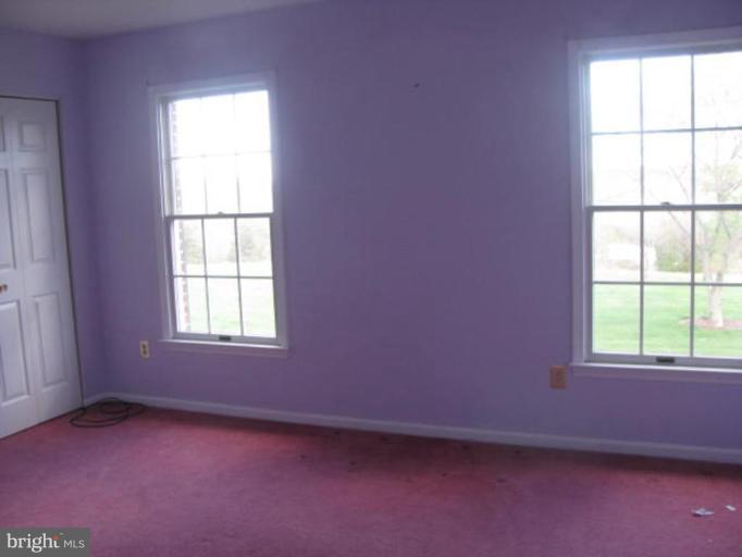 8388 Old Stillhouse Road Rixeyville, VA 22737 - Photo 15 of 15 an empty room with a window