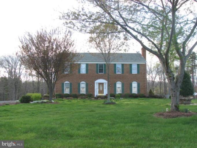8388 Old Stillhouse Road Rixeyville, VA 22737 - Photo 4 of 15 a front view of house with yard and green space