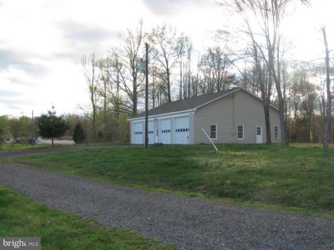 8388 Old Stillhouse Road Rixeyville, VA 22737 - Photo 5 of 15 a view of a house with backyard and garden