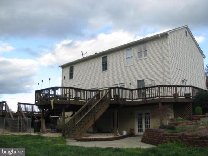 8388 Old Stillhouse Road Rixeyville, VA 22737 - Photo 6 of 15 a view of house with roof deck and entertaining space