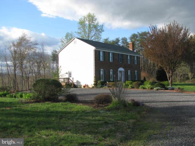 8388 Old Stillhouse Road Rixeyville, VA 22737 - Photo 7 of 15 a front view of house with yard and green space