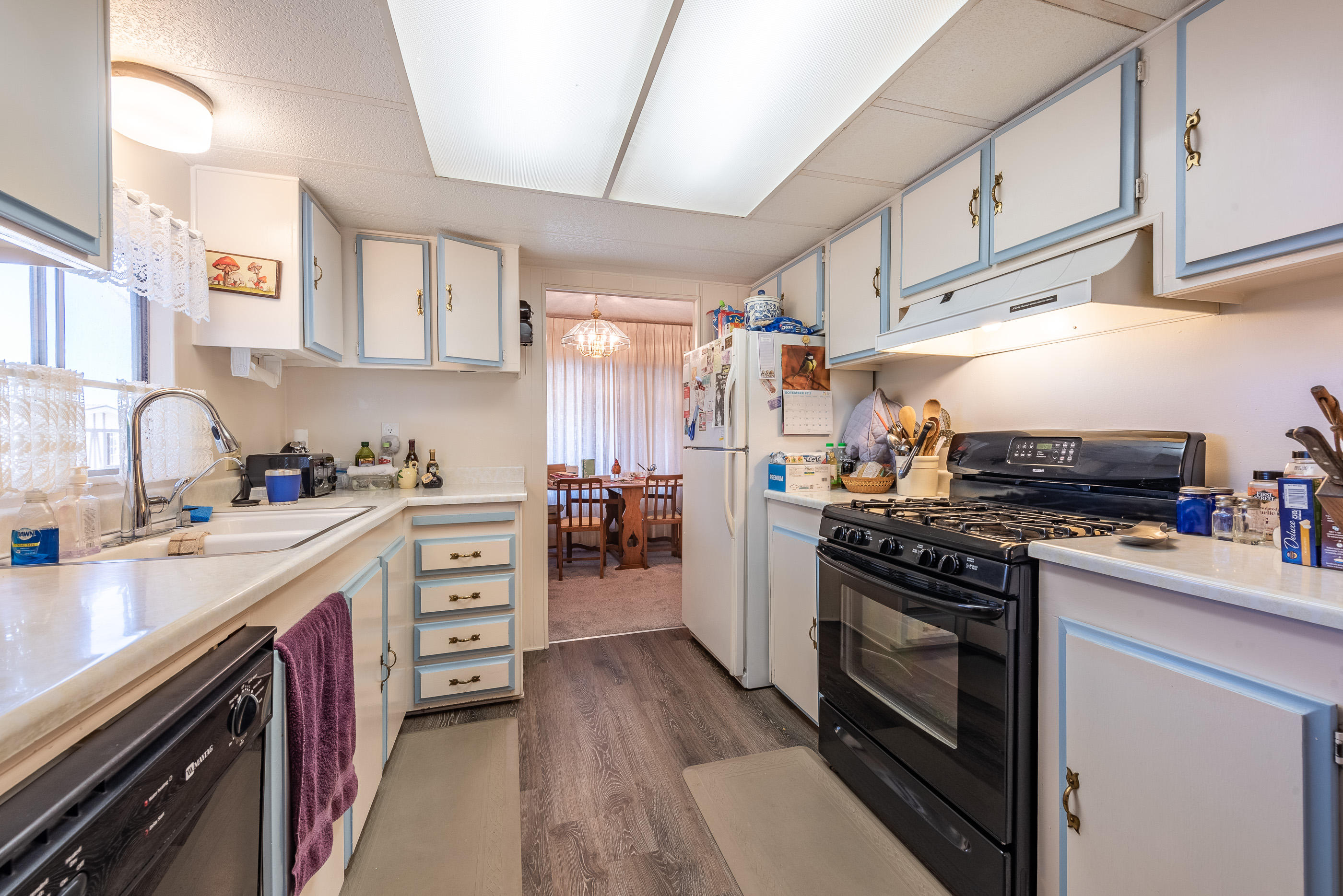 3950 Via Real, Unit 129 Carpinteria, CA 93013 - Photo 12 of 35 a kitchen with stainless steel appliances granite countertop a stove and a sink
