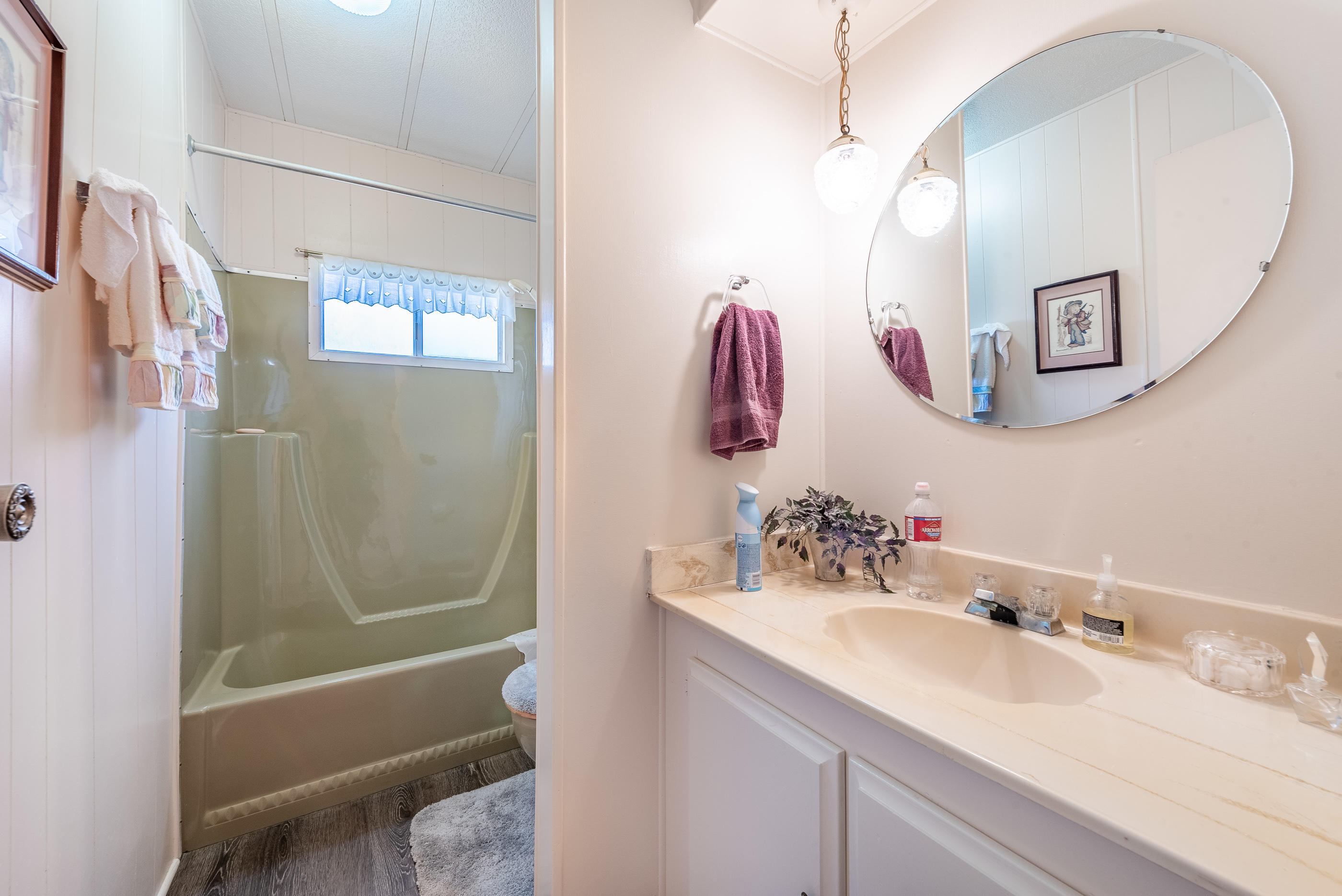 3950 Via Real, Unit 129 Carpinteria, CA 93013 - Photo 24 of 35 a bathroom with a sink and a mirror