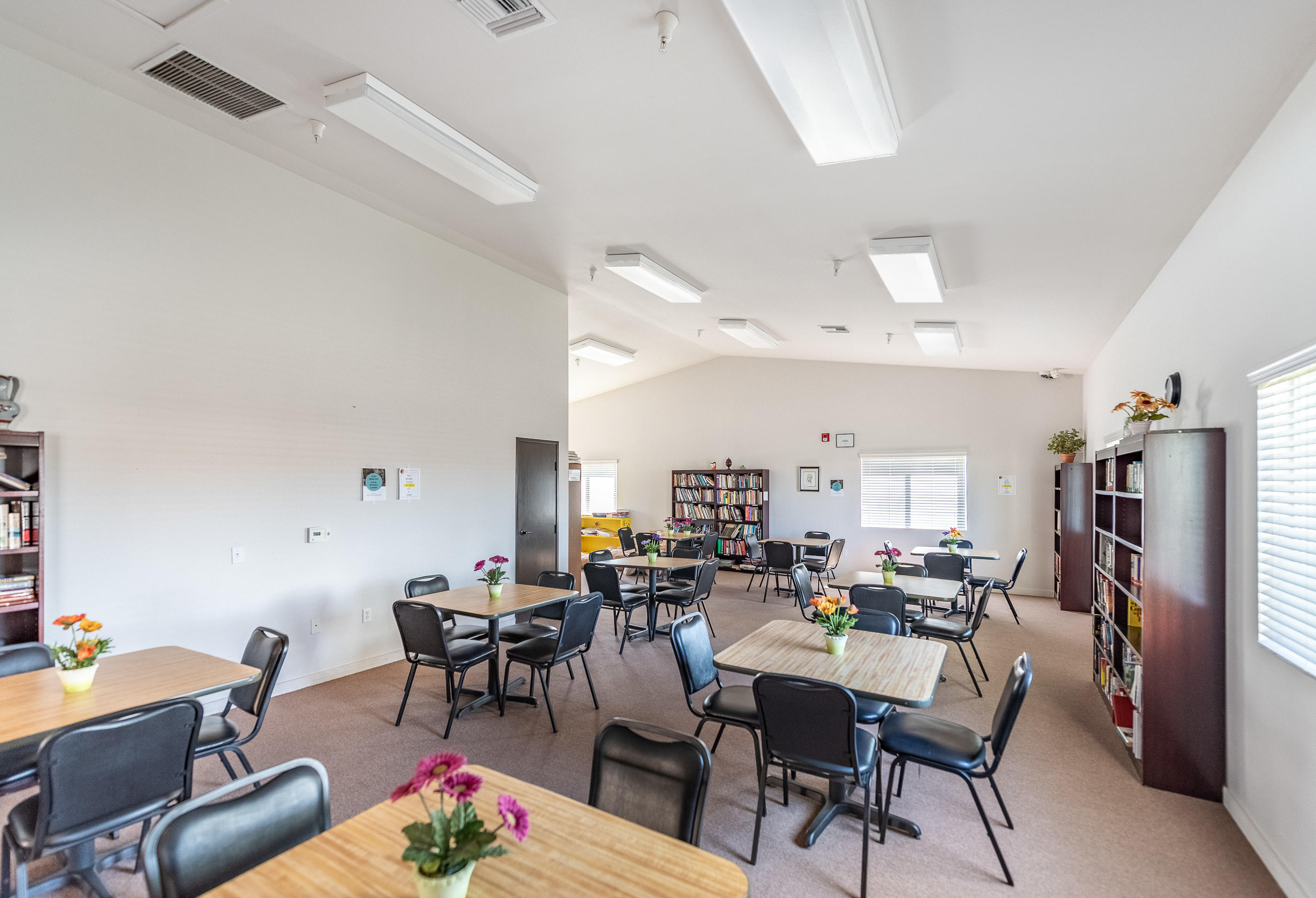 3950 Via Real, Unit 129 Carpinteria, CA 93013 - Photo 32 of 35 a room with stainless steel appliances a dining table and chairs