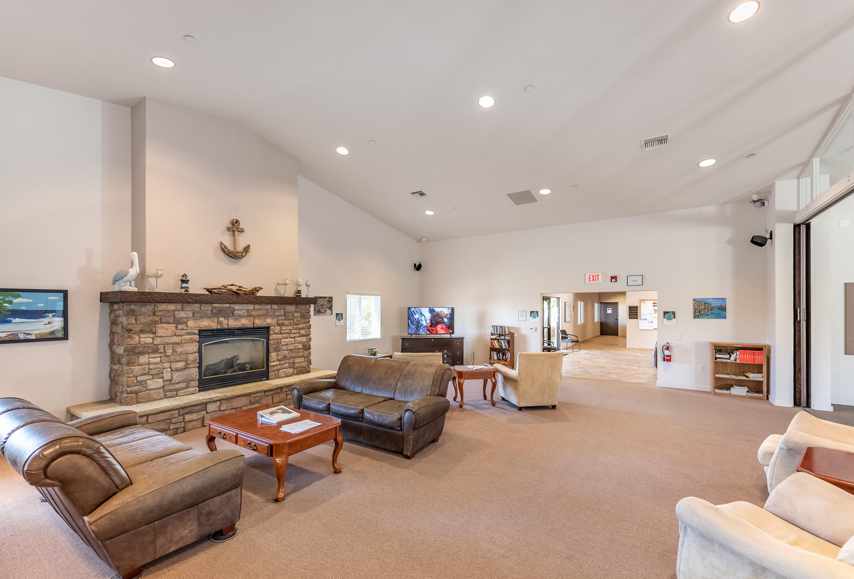 3950 Via Real, Unit 129 Carpinteria, CA 93013 - Photo 34 of 35 a living room with furniture and a fireplace
