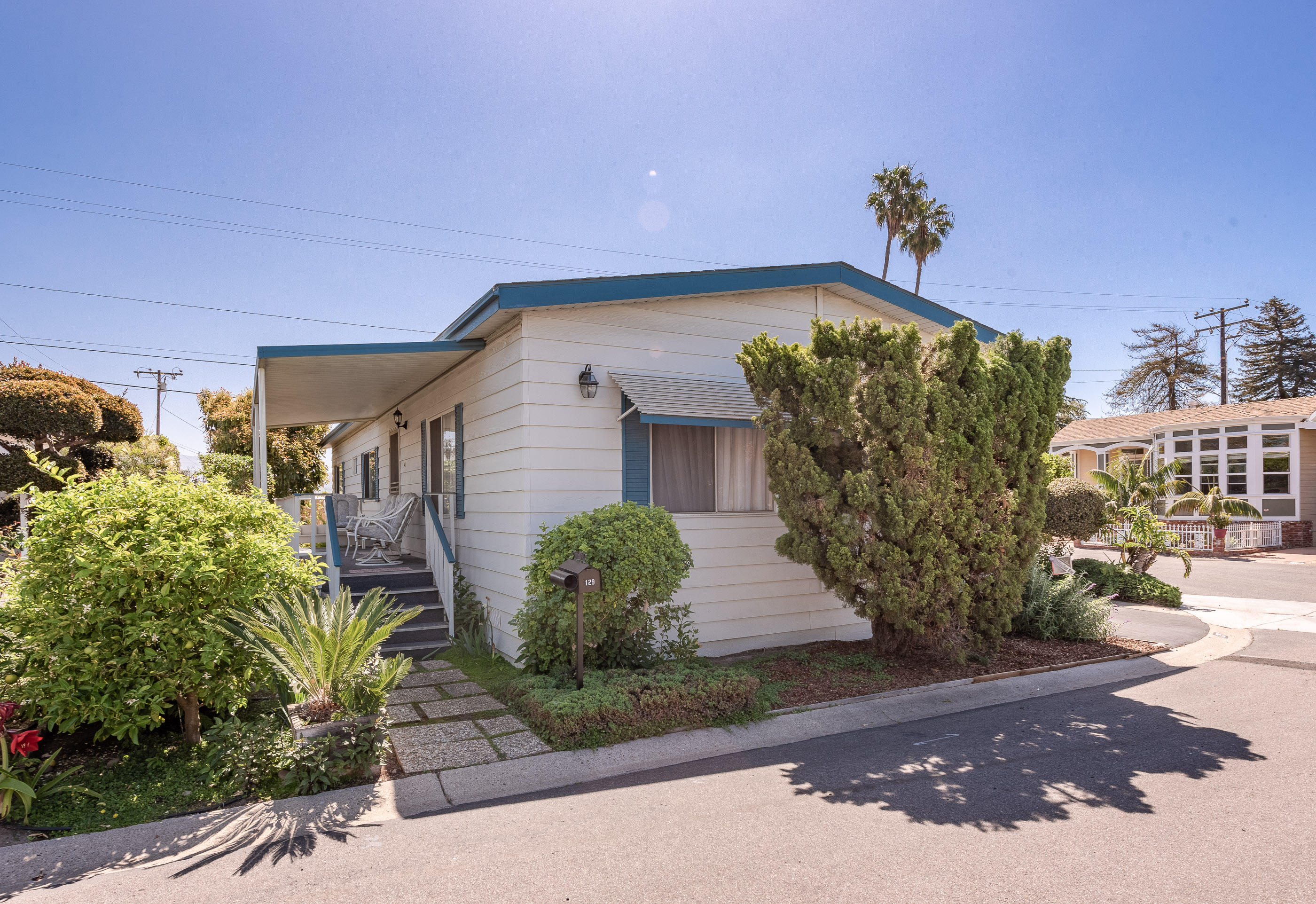 3950 Via Real, Unit 129 Carpinteria, CA 93013 - Photo 5 of 35 a front view of a house with garden