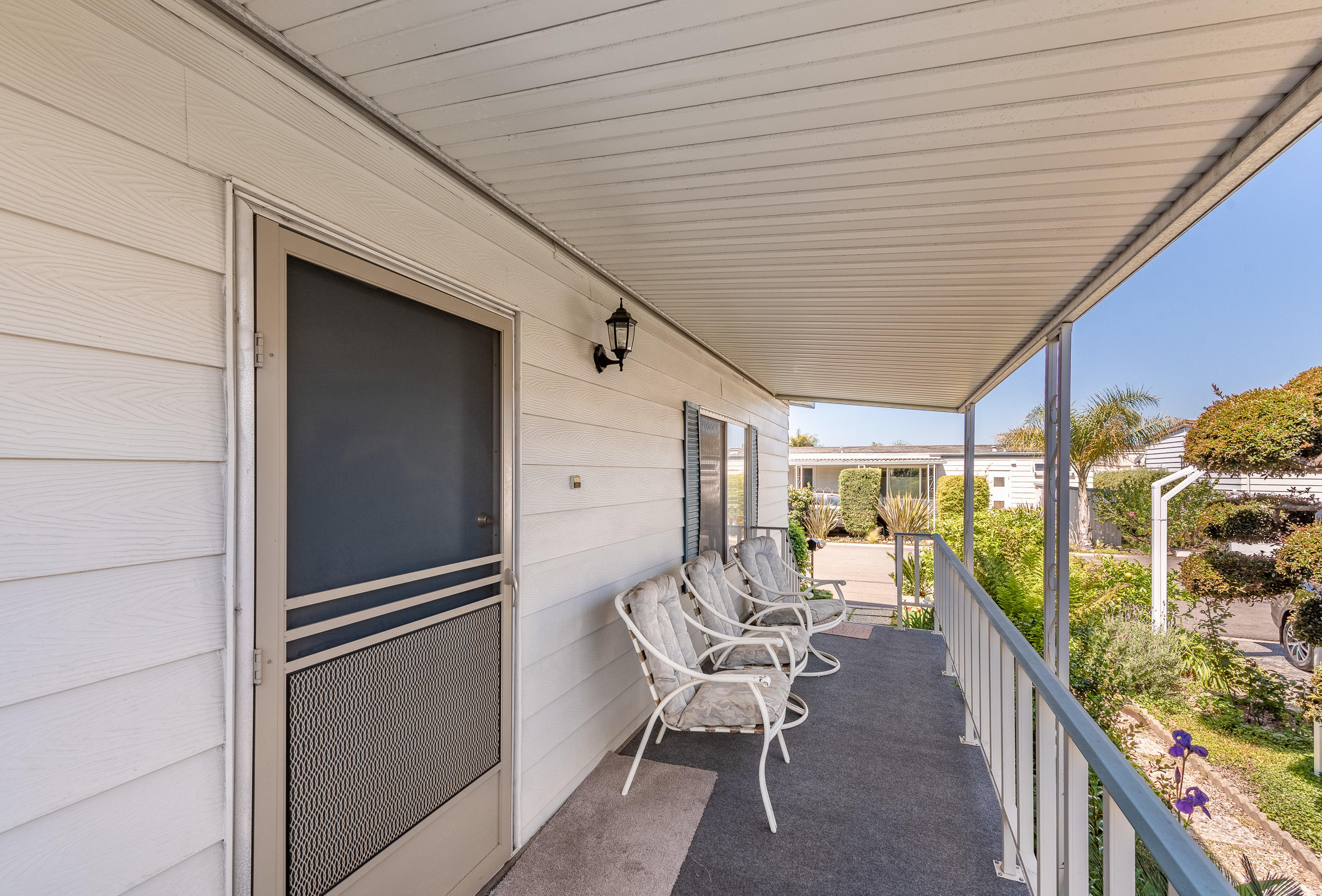 3950 Via Real, Unit 129 Carpinteria, CA 93013 - Photo 6 of 35 a balcony with chairs and table