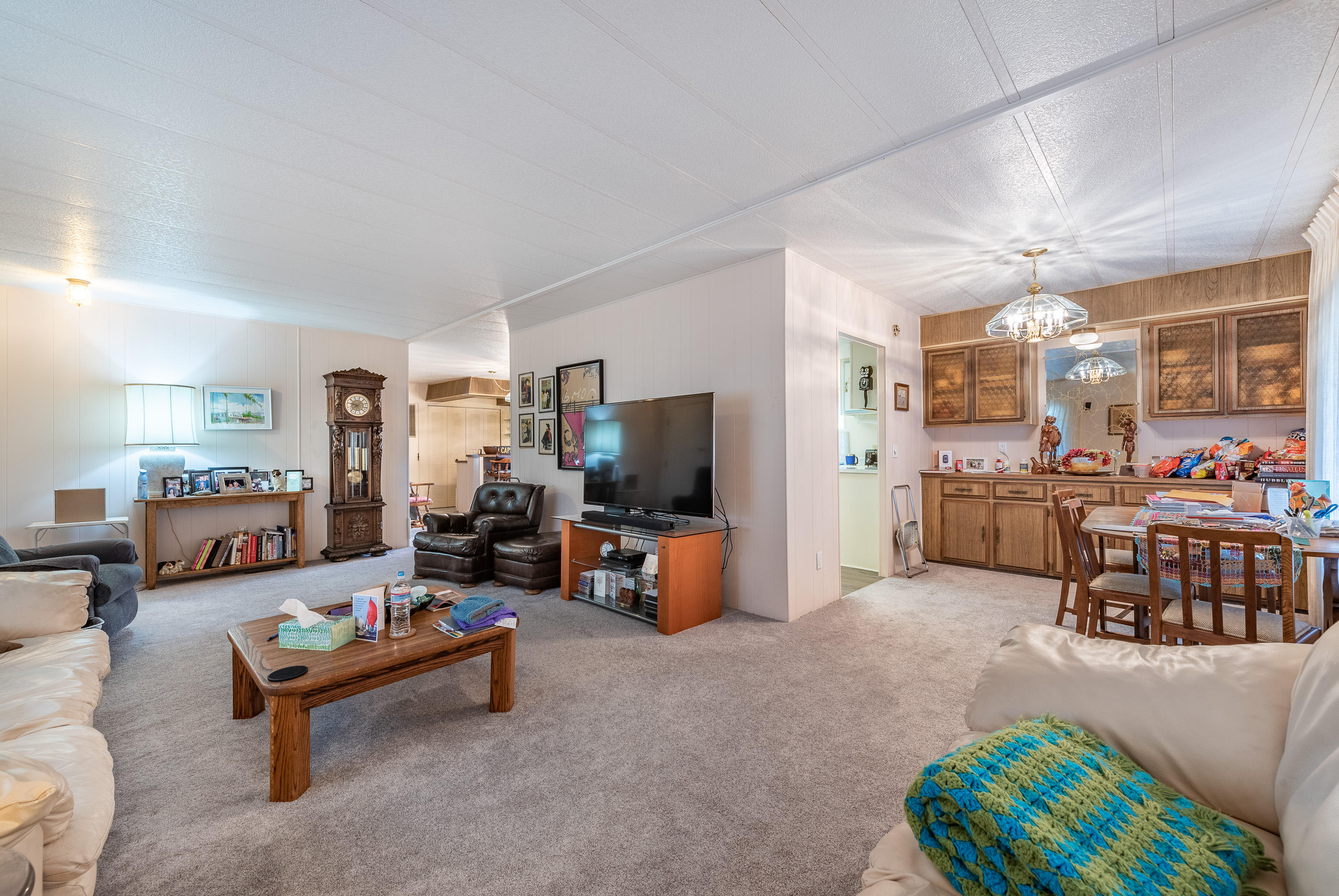 3950 Via Real, Unit 129 Carpinteria, CA 93013 - Photo 8 of 35 a living room with furniture and a flat screen tv