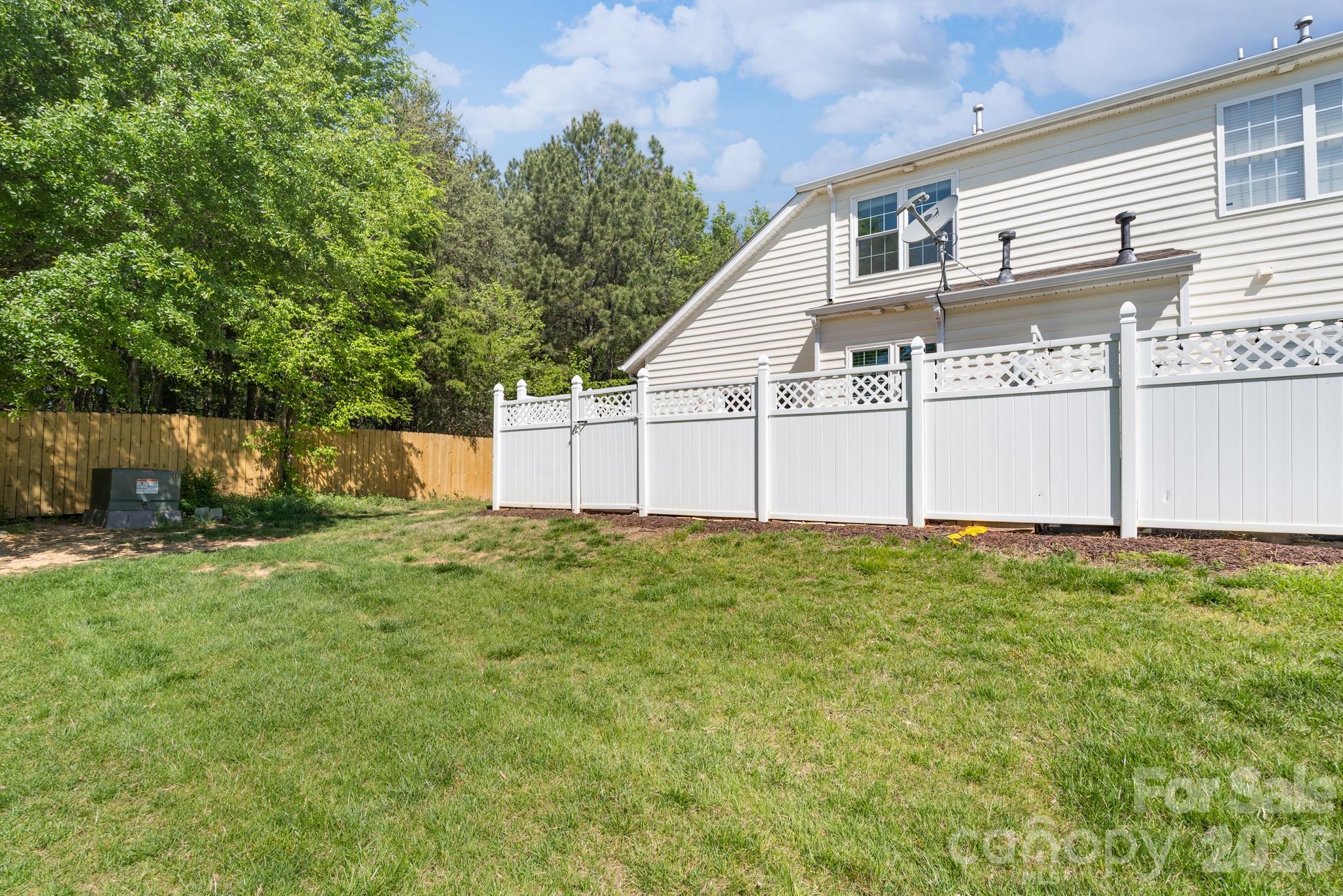 643 Brickdust Court Fort Mill, SC 29708 - Photo 23 of 28 a house with a yard