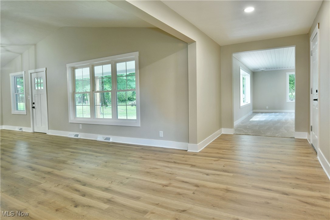 7655 Connelly Road Masury, OH 44438 - Photo 20 of 46 Entryway featuring light wood finished floors, lofted ceiling, and recessed lighting