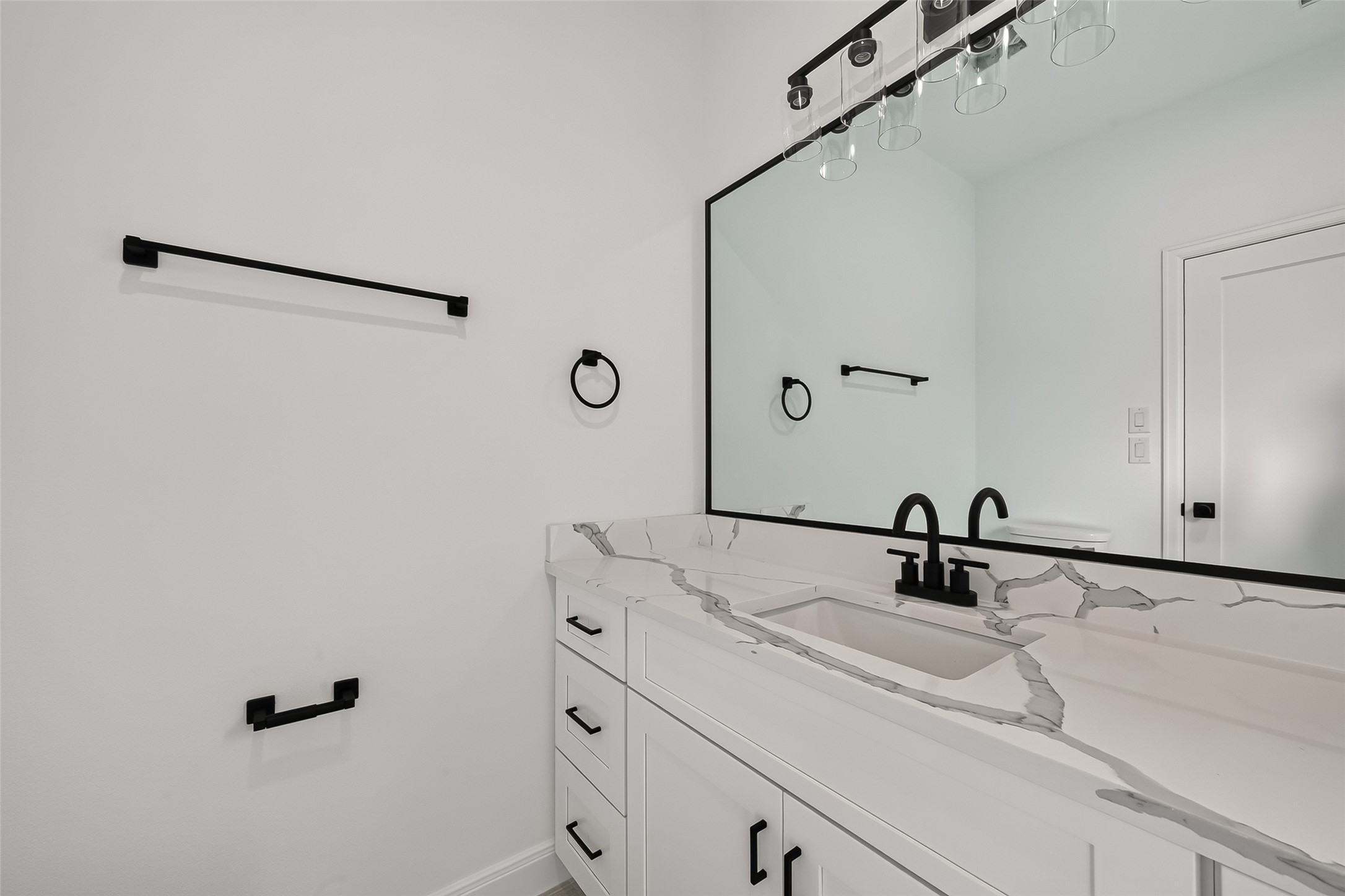 8110 Carver Road Houston, TX 77088 - Photo 29 of 38 Well-designed primary bath with modern finishes and a clean, contemporary feel.