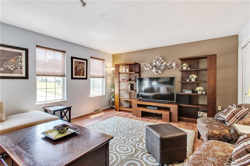 210 Grace Street McKees Rocks, PA 15136 - Photo 3 of 22 The spacious living room is large enough for plenty of furniture.